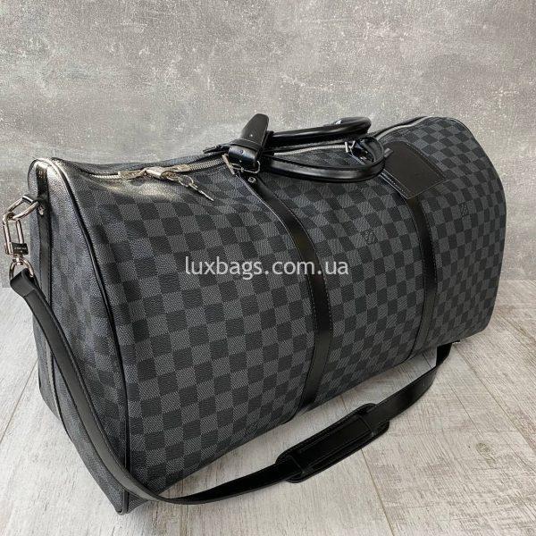 Дорожная стильная сумка Louis Vuitton.